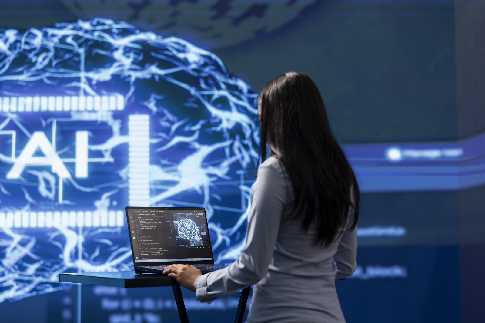 Admin using laptop to maintenance artificial intelligence neural networks